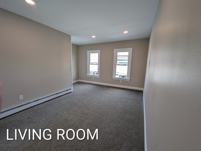 Sala de estar - 48 E Main St Unidad 2