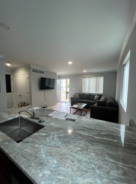 Spacious Living area + 1/2 bath on main floor for your guests - 906 Lincoln Ave