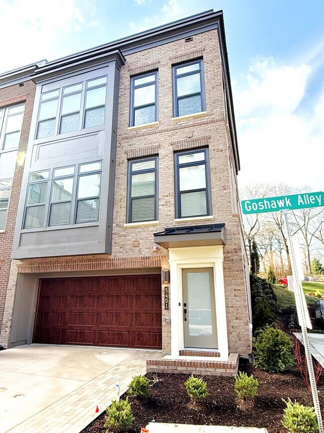 Building Photo - Brand new 4 level, 4 Bedroom Townhome with Elevator!