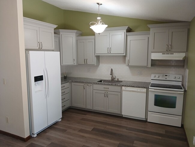 Photo - 3 bedrooms, 2 bathrooms, 2 car garage with fenced in yard!