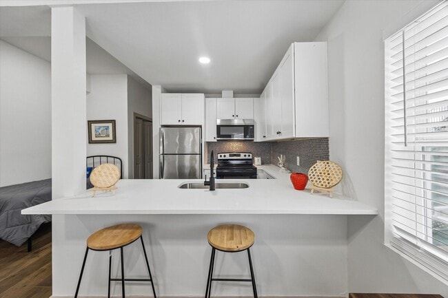 Building Photo - 1224 Welch St Unit 2