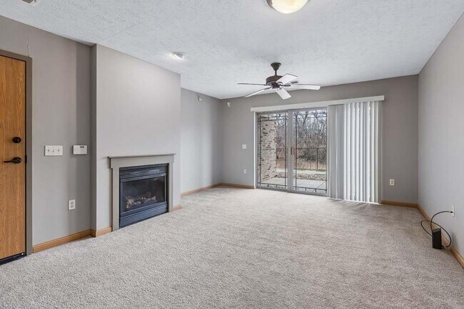 Relax and unwind in this bright, open living space featuring cozy comforts and room to gather with the people who matter most.