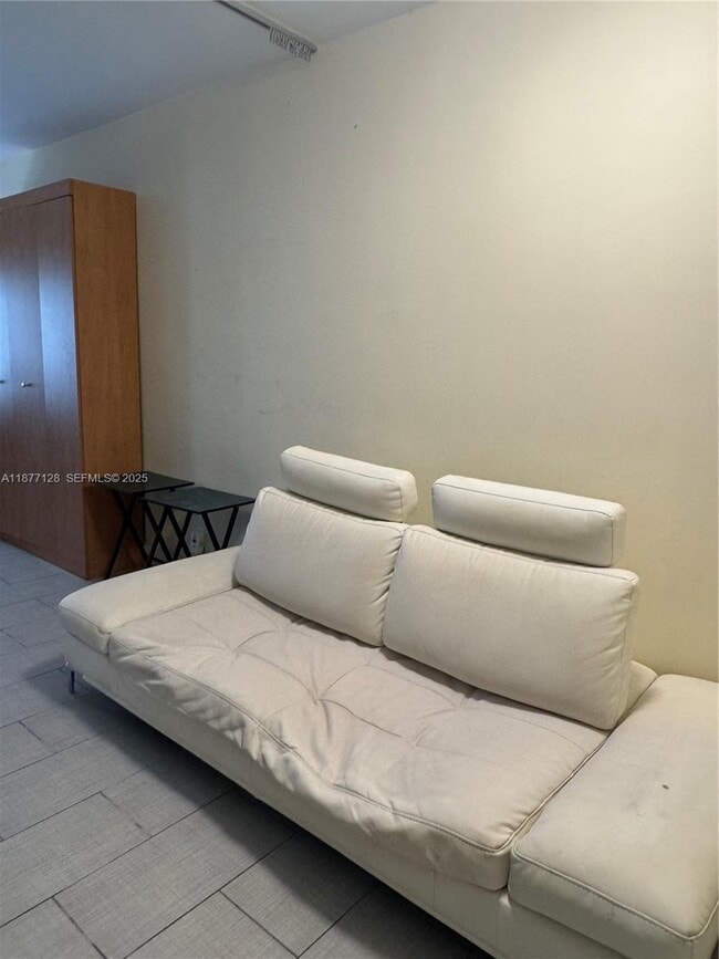 Building Photo - 6494 Collins Ave Unit 25