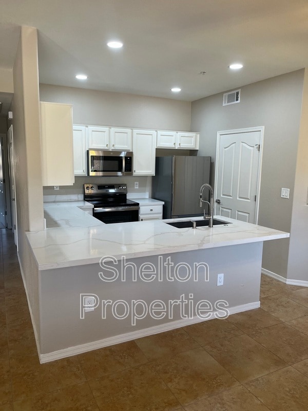 Photo - 6920 E 4th St Unit 103