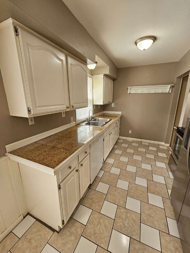 Photo - 3-Bedroom, 2-Bathroom Ranch with Hardwood Flooring, Tiled Kitchen and Finished Basement with a 2 ...