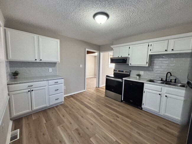 Photo - Newly Remodeled 3 Bedroom Home with Fenced Yard!