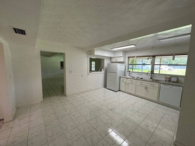 Photo - Spacious 2BR 2BA Home w/ Laundry on site + Driveway Parking + Patio & Yard in Miami
