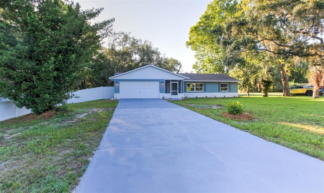 Photo - Recently updated, custom 3/2/2 on fenced c...