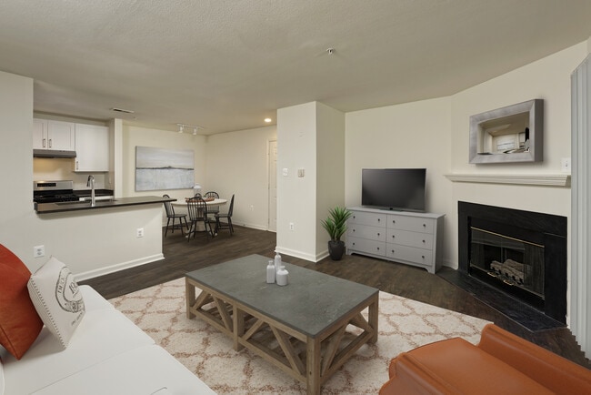 Renovated Package II kitchen, dining, and living areas with hard surface flooring