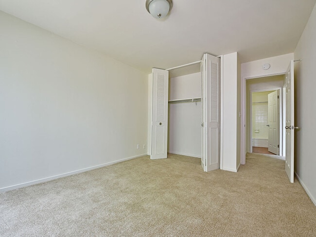 A bedroom at Grand Bend Club Apartments.