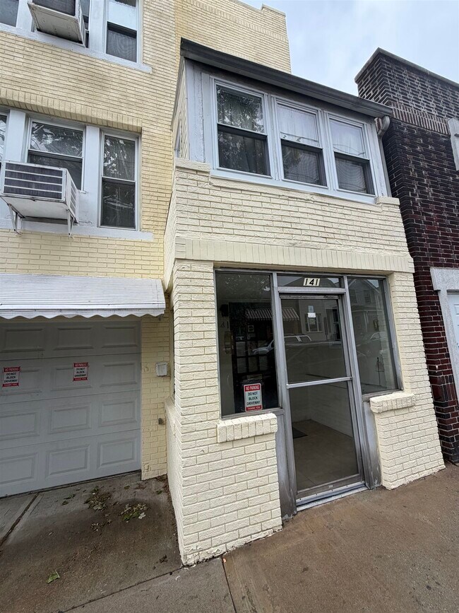 Building Photo - 141 67th St Unit 1