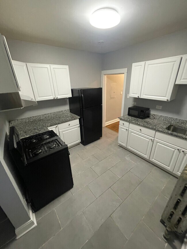 Photo - 543 E 80th St Unidad 1