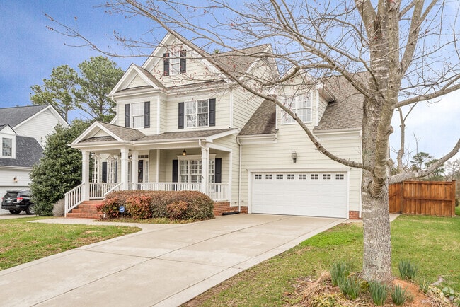 Building Photo - 4 bedroom home with fenced yard close to D...