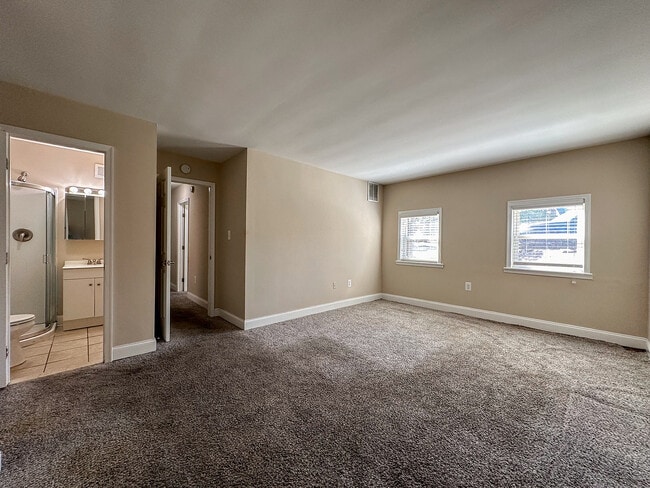 Primary Bedroom with Attached Full Bathroom - Springfield Valley Apartments