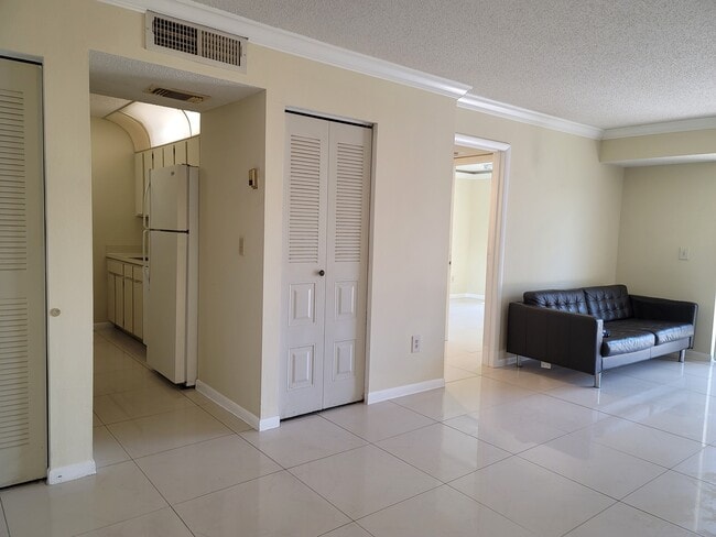 View from LR towards Kitchen & Bedroom - 8200 SW 210th St Unit 102