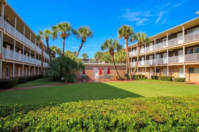 Photo - Coastal Condo Living with Pensacola Bay Views, Waterfront Pool Access & Prime Location Near Downt...