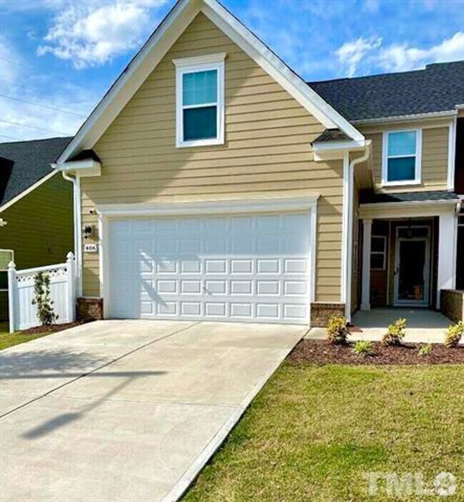Building Photo - Townhome with Fenced Yard & 2 Car Garage!!