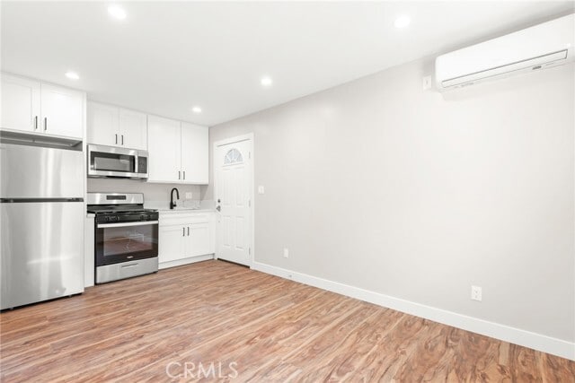 Photo - 145 E 36th Pl