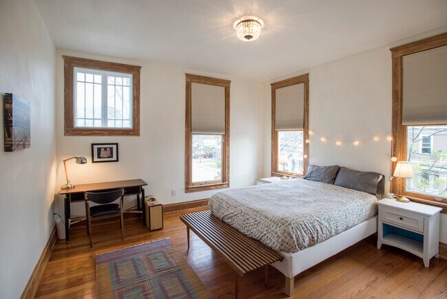 Bedroom #1 with queen sized bed - 403 Gillespie St Unit Emma Suite