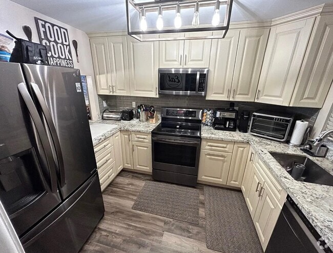 Building Photo - 9410 Tangerine Pl Unit 403 Rental