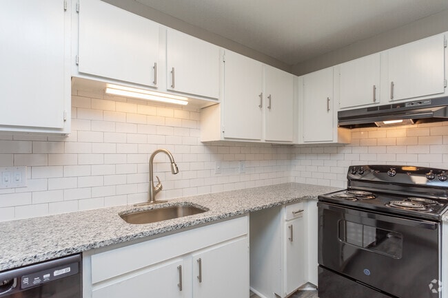 3BR, 2.5BA - 1541SF - Kitchen At the Henley Apartments