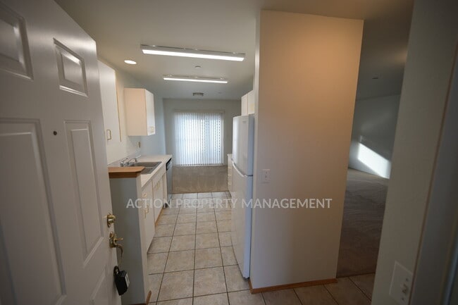 Photo - 2 bed, 2 bath, 1 car garage- water, sewer and yard care included! Unit A