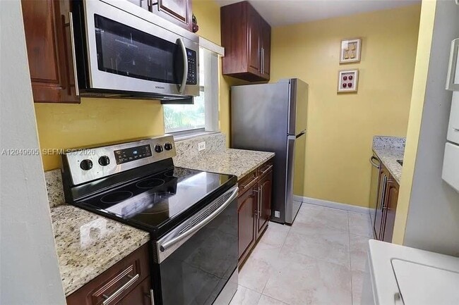 Building Photo - 3246 NW 102nd Terrace Unit 308-F