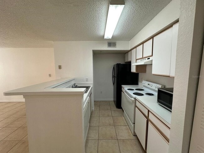 Photo - 2210 Grand Cayman Ct Unit 1711
