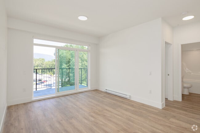 3BR, 2BA - 847SF - Living Room - Westminster Junction