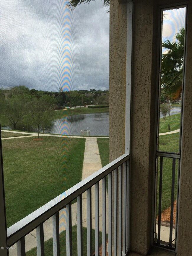 Building Photo - 7801 Point Meadows Dr Unit 7203