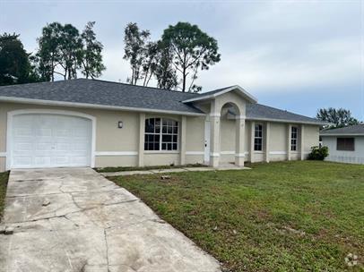 Building Photo - Charming 3-Bedroom Home in Fort Myers – An...