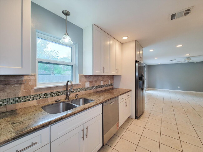Photo - 3 Bed Home for Rent in Westbury 77035 with Large Fenced Yard & Deck