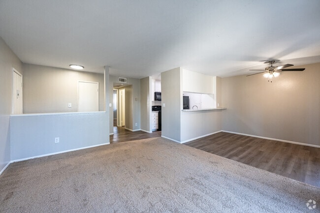 2BR, 1.5BA - 950SF - Living Room/Dining Room - VILLAGE GREEN