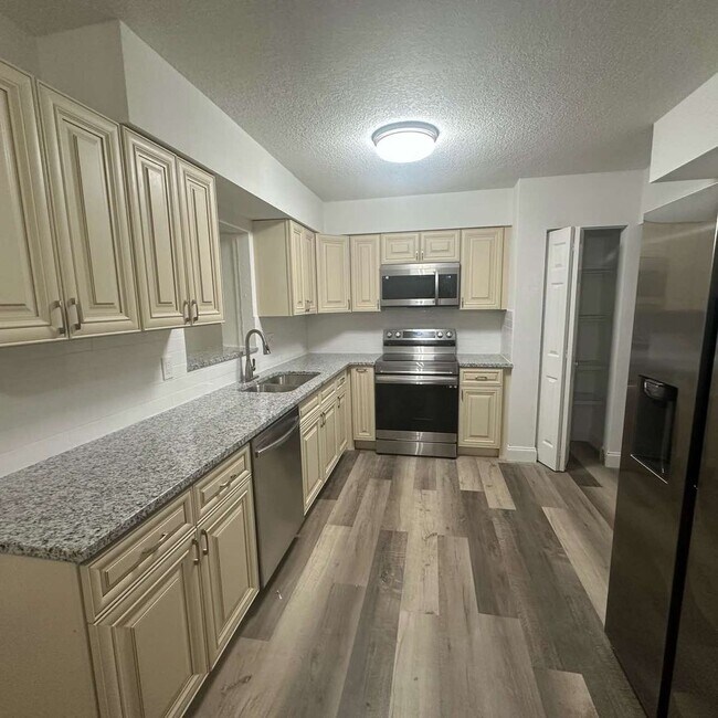 Photo - 3 bedroom 2 bath home with lawn cutting in...