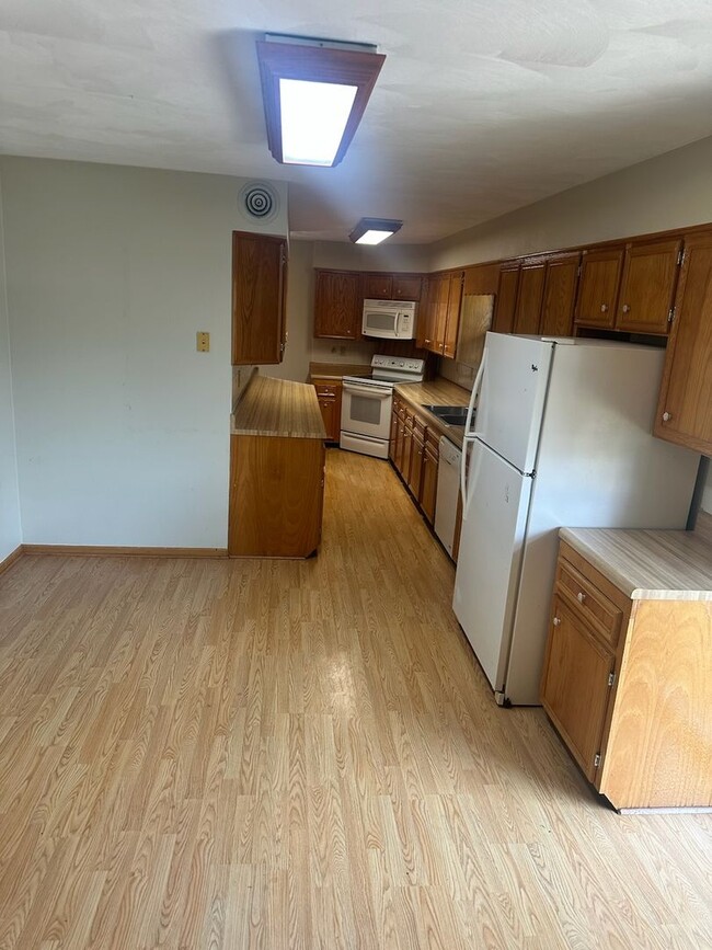 Photo - Spacious 3-Bedroom Home with Bonus Rooms i...