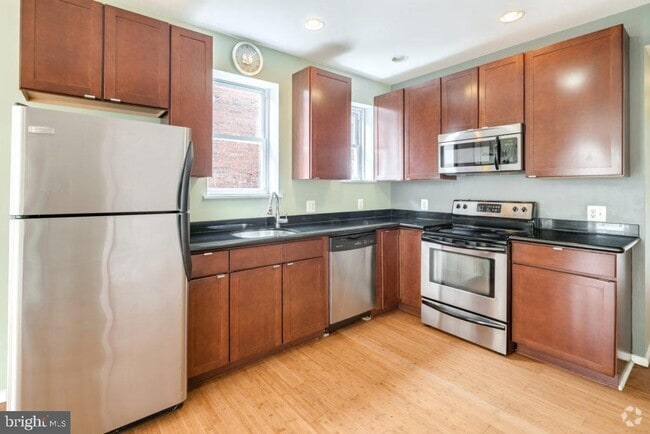 Building Photo - 5035 Walton Ave Unit 2ND FLR Rental