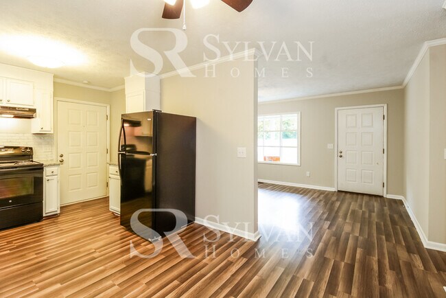 Photo - Enjoy living the good life in this 4 BR, 3 BA brick rancher