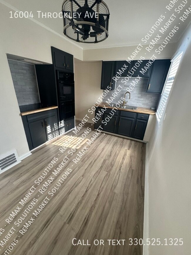 Photo - 16004 Throckley Ave