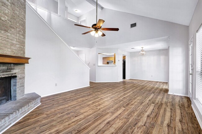 Photo - ***APPLICATION CURRENTLY UNDER REVIEW***Spacious Two-Story with Soaring Ceilings & No Carpet
