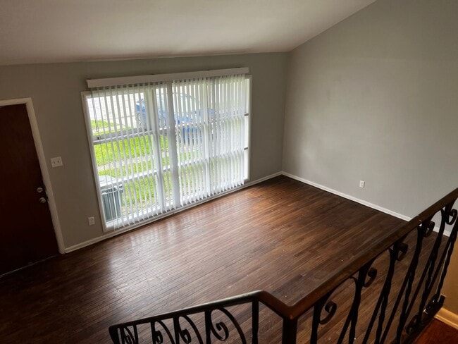 Photo - 3 BR 1.5 BA split-level with attached 1 car garage