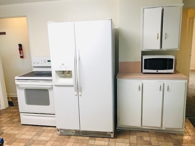 Photo - Beautiful home, new cabinets, updated carp...