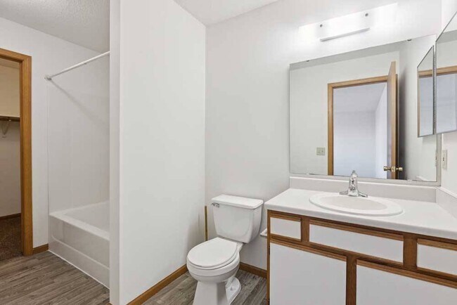 Bright, functional bathrooms offer a comfortable space to refresh and keep daily routines running smoothly.