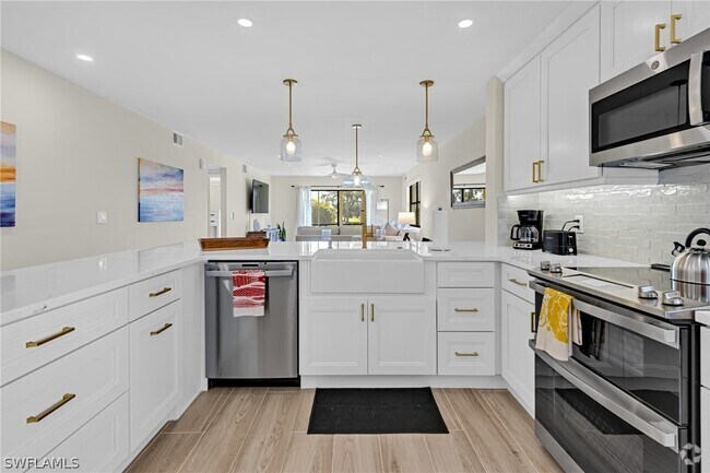 Building Photo - 12621 Kelly Sands Way Unit 303 Rental