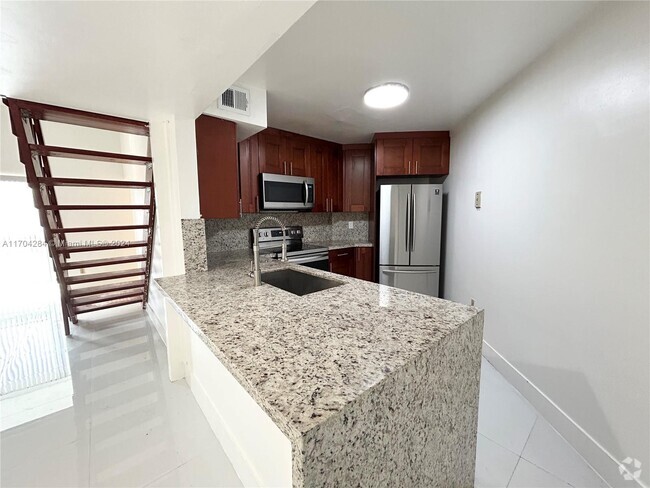 Building Photo - 9433 Fontainebleau Blvd Unit 209 Rental