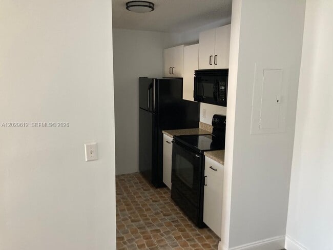 Building Photo - 1701 Village Blvd Unit 107