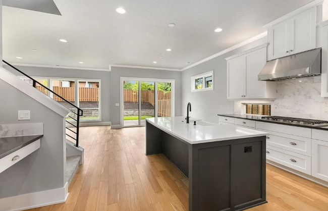 Photo - Stunning Bethany Farmhouse with Chef’s Kitchen, Media Room, Main-Level Suite & Luxury Designer Fi...