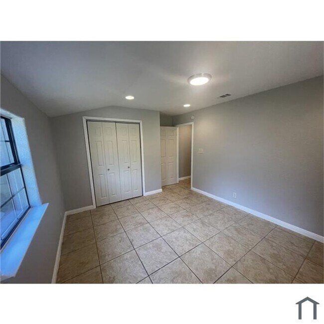 Photo - Discover your dream home in this beautifully renovated four-bedroom, two-bathroom house.