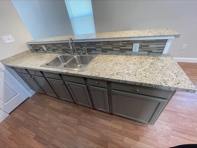 Photo - Beautifully remodeled, three bedroom, one ...