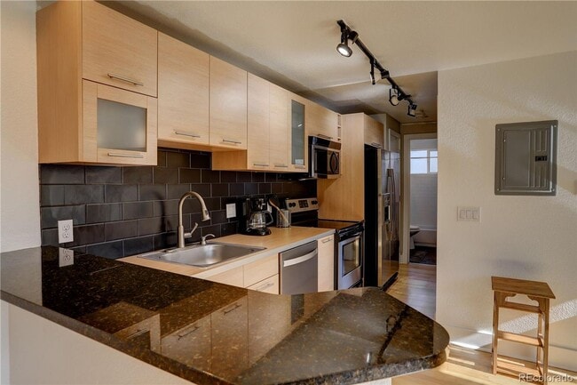 Photo - LOCATION LOCATION!! Open and spacious corner unit that offers abundant natural light and is conve... Unit 305