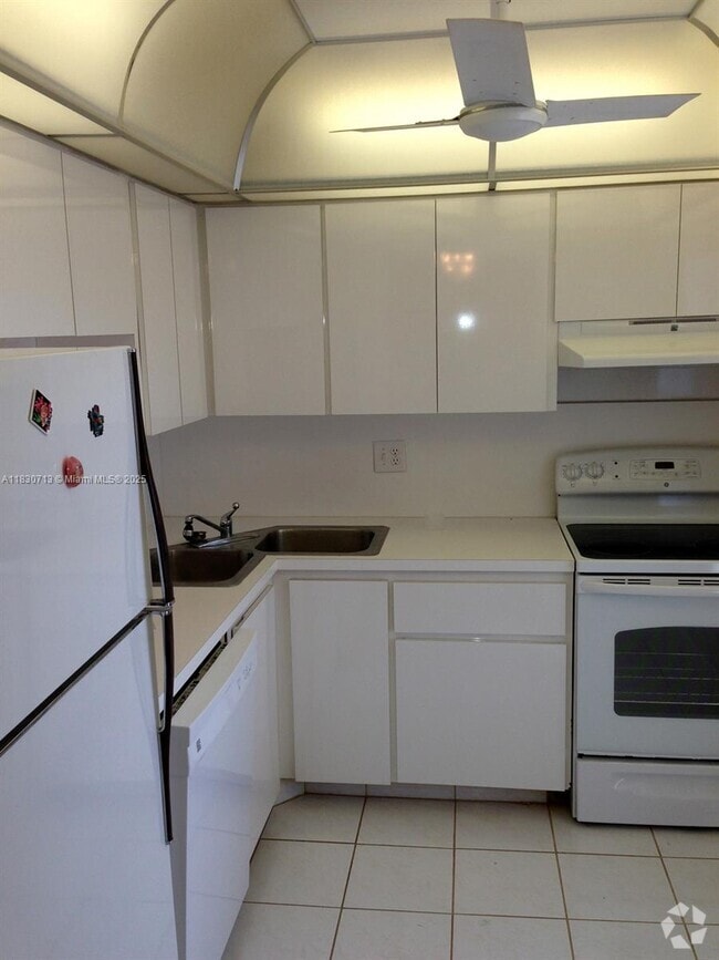Building Photo - 6070 NW 64th Ave Unit 307 Rental